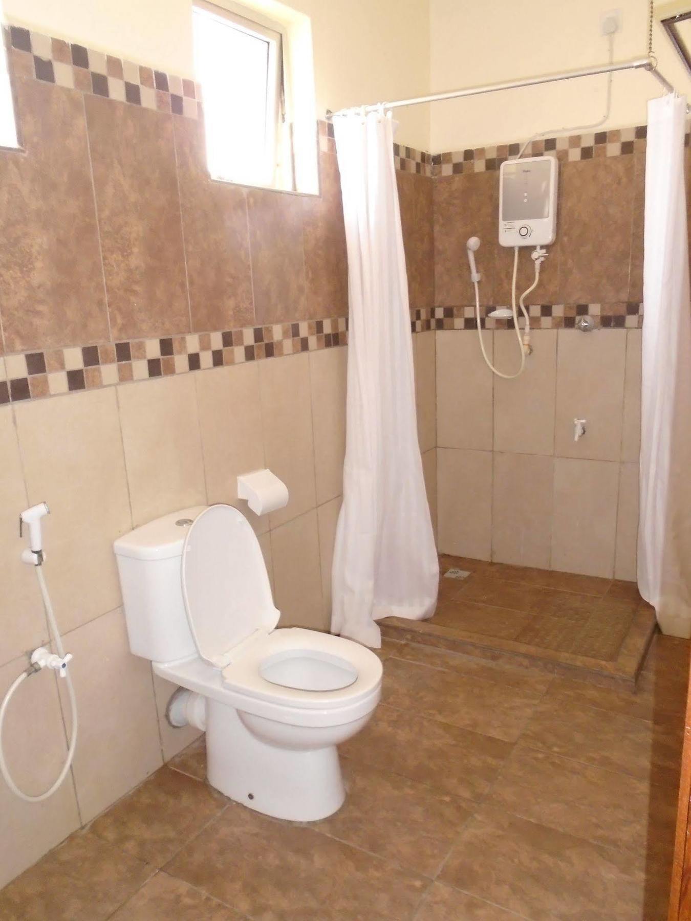 Pawenzi Serviced Apartments Момбаса Екстер'єр фото