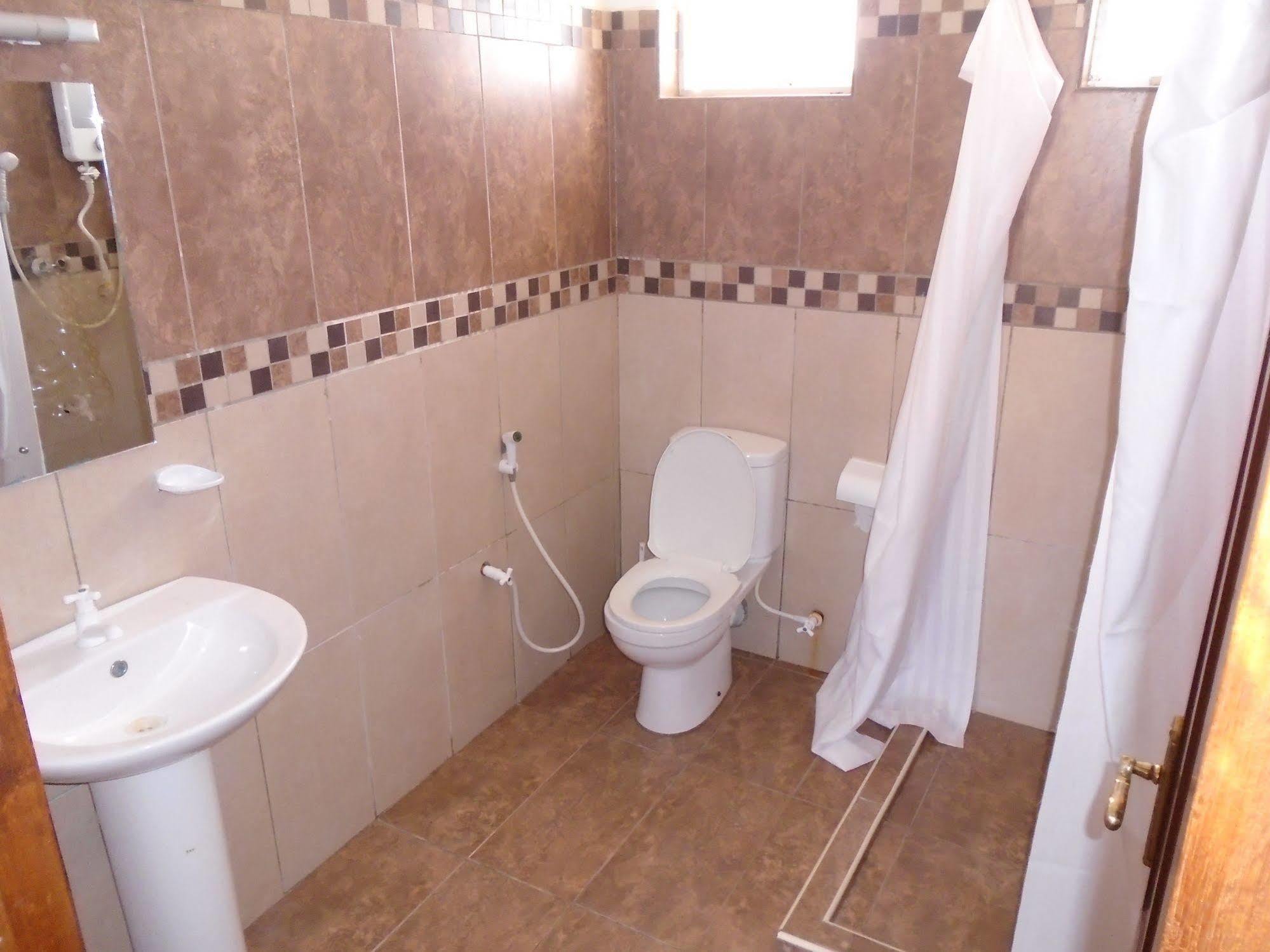 Pawenzi Serviced Apartments Момбаса Екстер'єр фото
